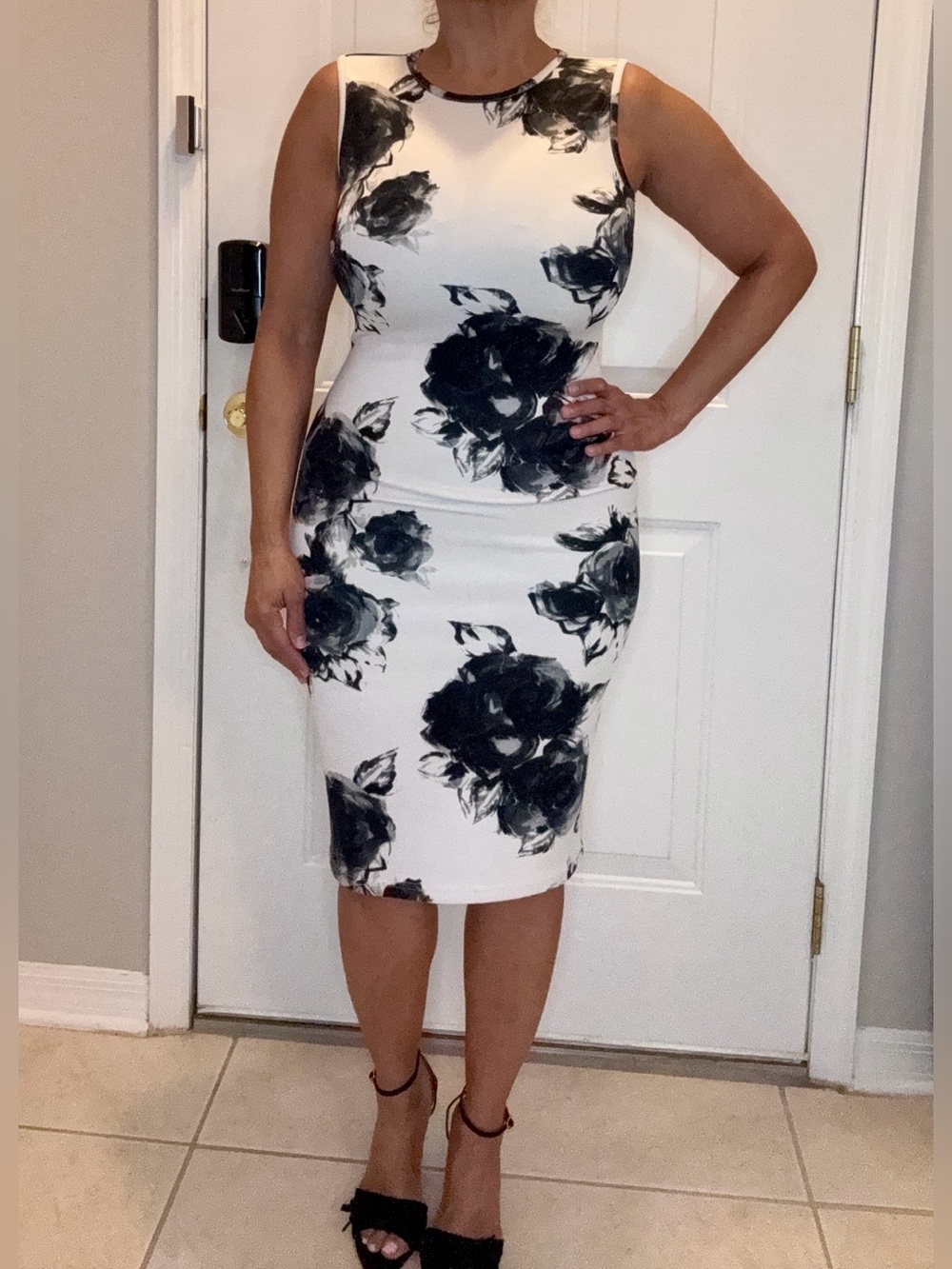 Sleeveless White Dress with Black Floral Print